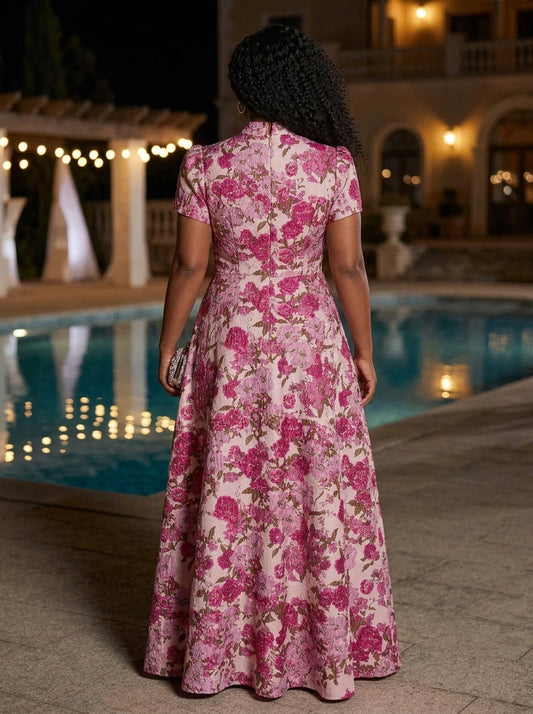 Pink floral print formal gown back view, high mandarin collar, short sleeves, center back zipper and flowing floor length A-line skirt
