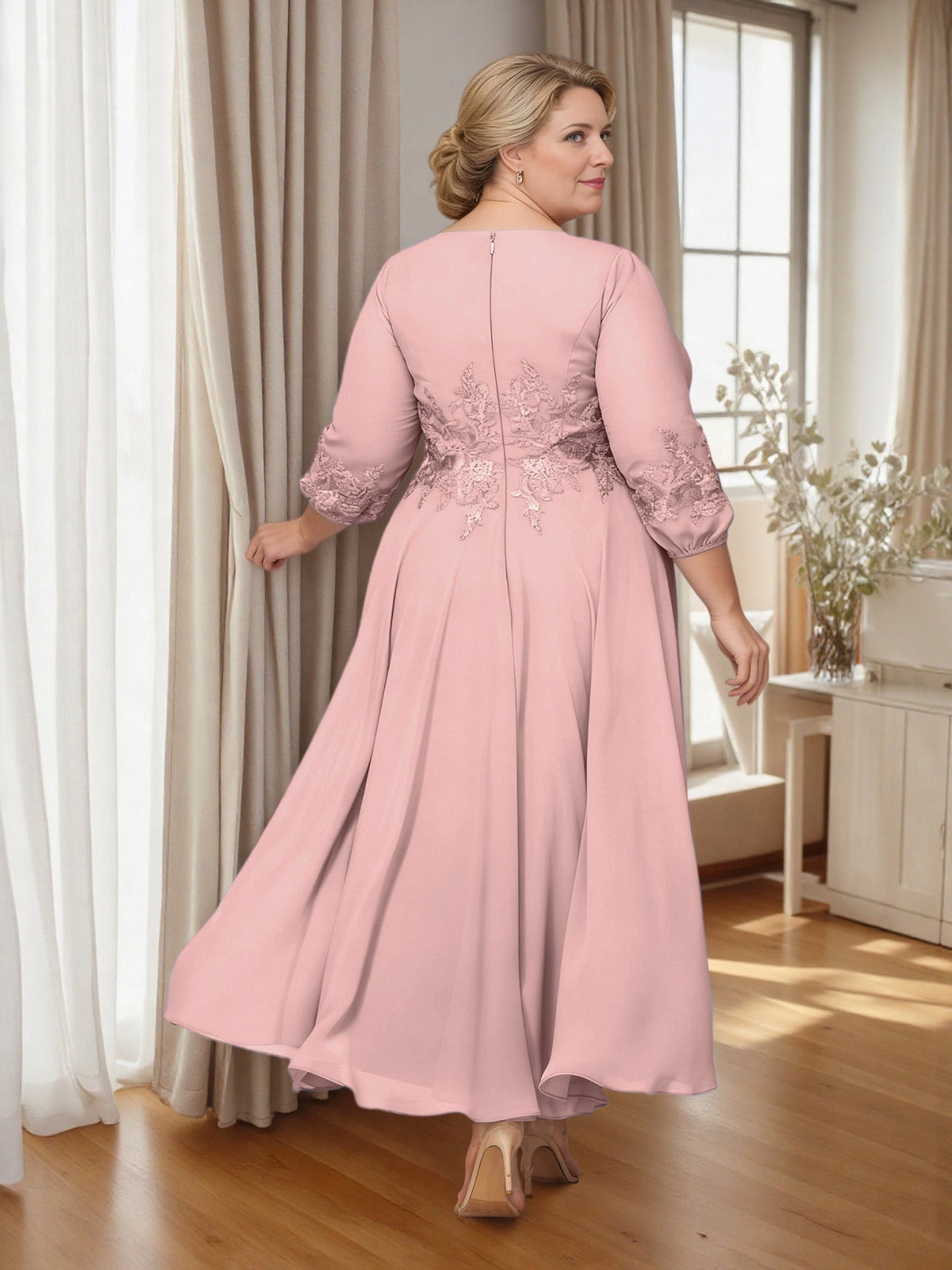 Pink mother of the bride dress with lace waist detail and zipper back