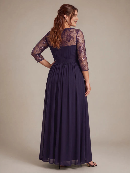 Plum plus size evening gown back view, round neck, sequin lace upper back, center back zipper, sheer 3/4 sleeves and flowing chiffon long skirt