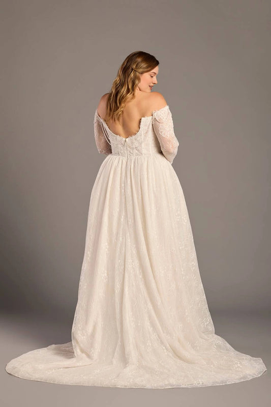 Ivory plus size wedding dress with low V-shaped lace back, center zipper, sheer long sleeves and flowing tulle train