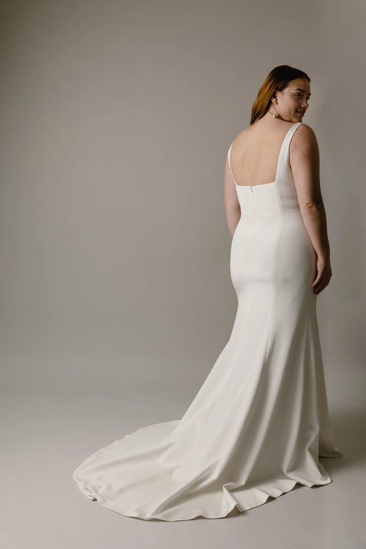 Ivory plus size wedding dress with low square back, center zipper closure, fitted mermaid silhouette and elegant sweeping train back view