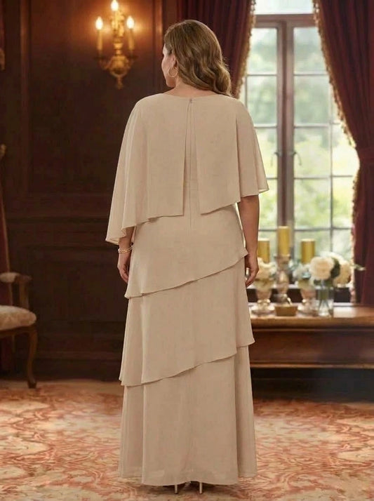 Back view of plus size champagne mother of the bride dress featuring layered cape design, elegant coverage and center zipper closure.