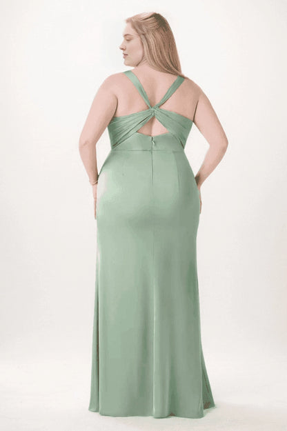 Sage green satin bridesmaid dress with angled straps, a central twist, triangular back cutout and center-back zipper, back view.