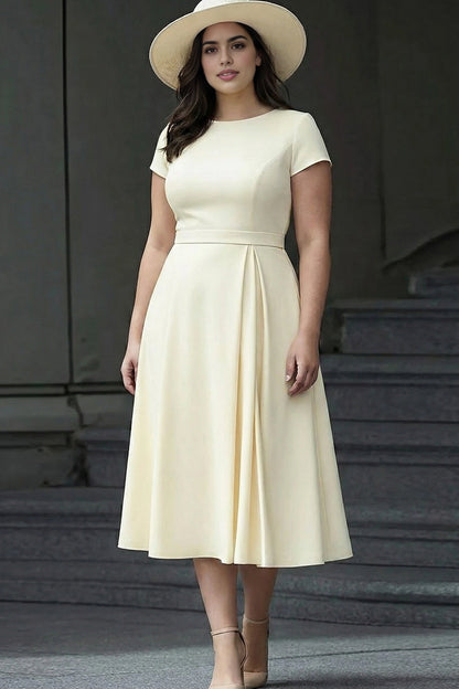 Ivory plus size A-line mother of the bride midi dress with round neckline, short sleeves and pleated skirt.