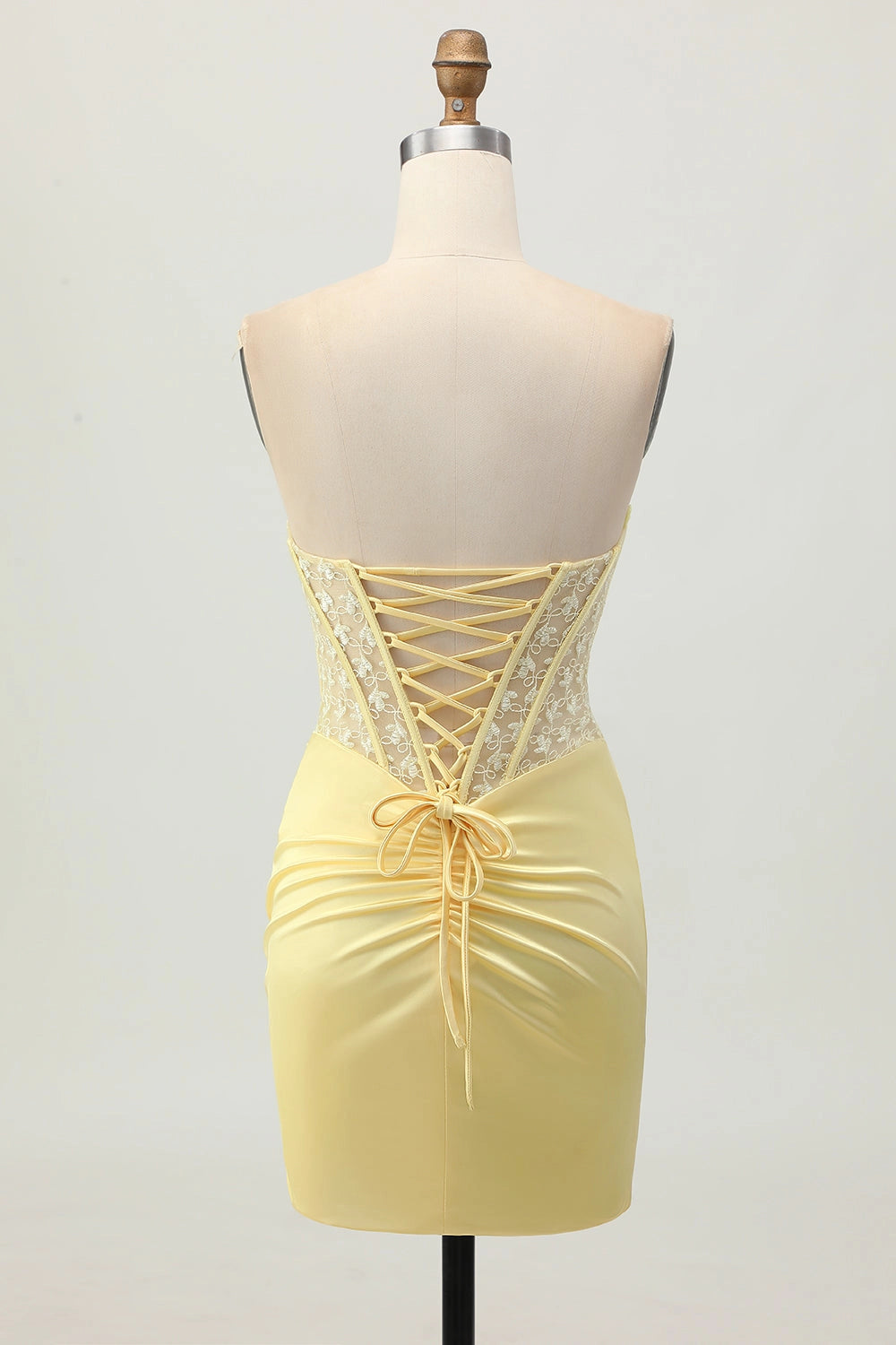 Back view RoselleDress pale yellow lace up back corset mini dress lace homecoming gown