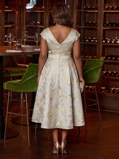 Champagne gold brocade plus size midi dress back view, deep V-back, center back zipper, cap sleeves and full pleated A-line skirt
