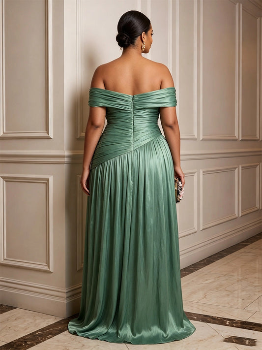 Model wearing roselledress sage green satin wedding guest dress off‑shoulder invisible zip back ruched rear view