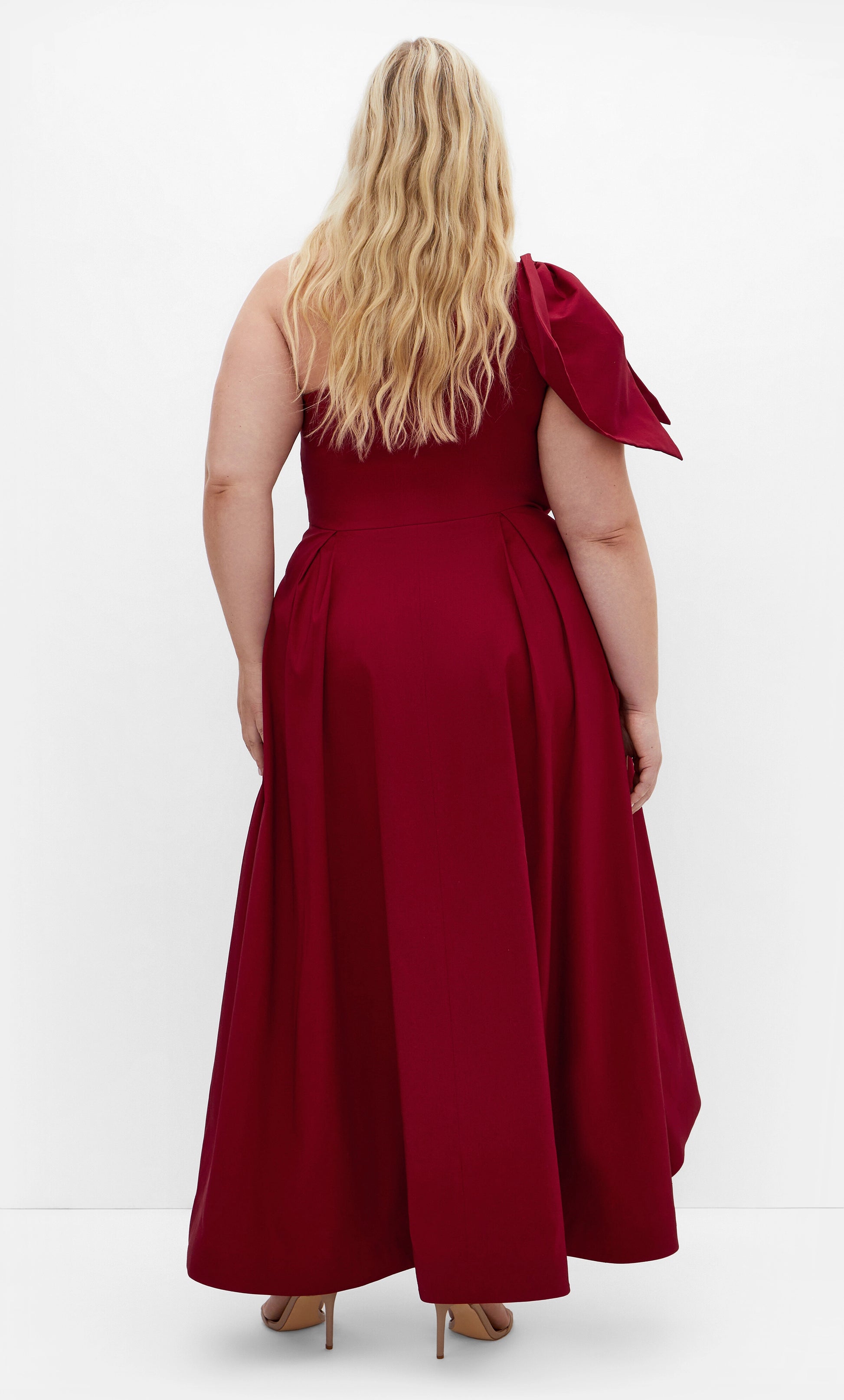 RoselleDress burgundy plus size formal wedding guest gown one‑shoulder bow back view high‑low a‑line skirt back view