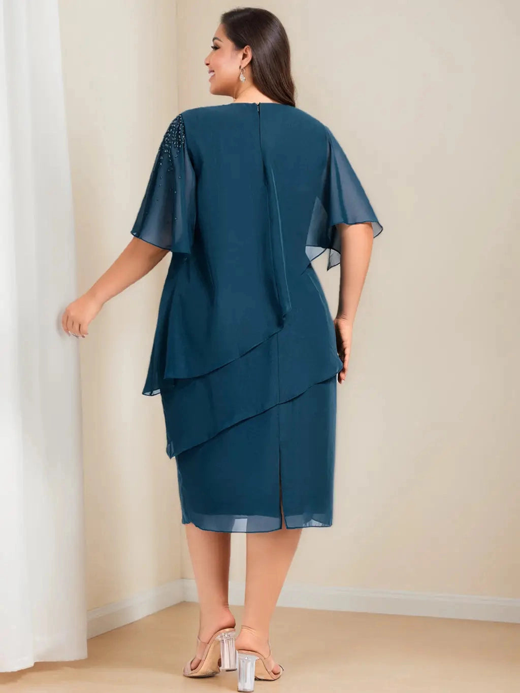 back view Roselledress curvy teal chiffon dress zip back slit hem tiered wedding guest midi dress