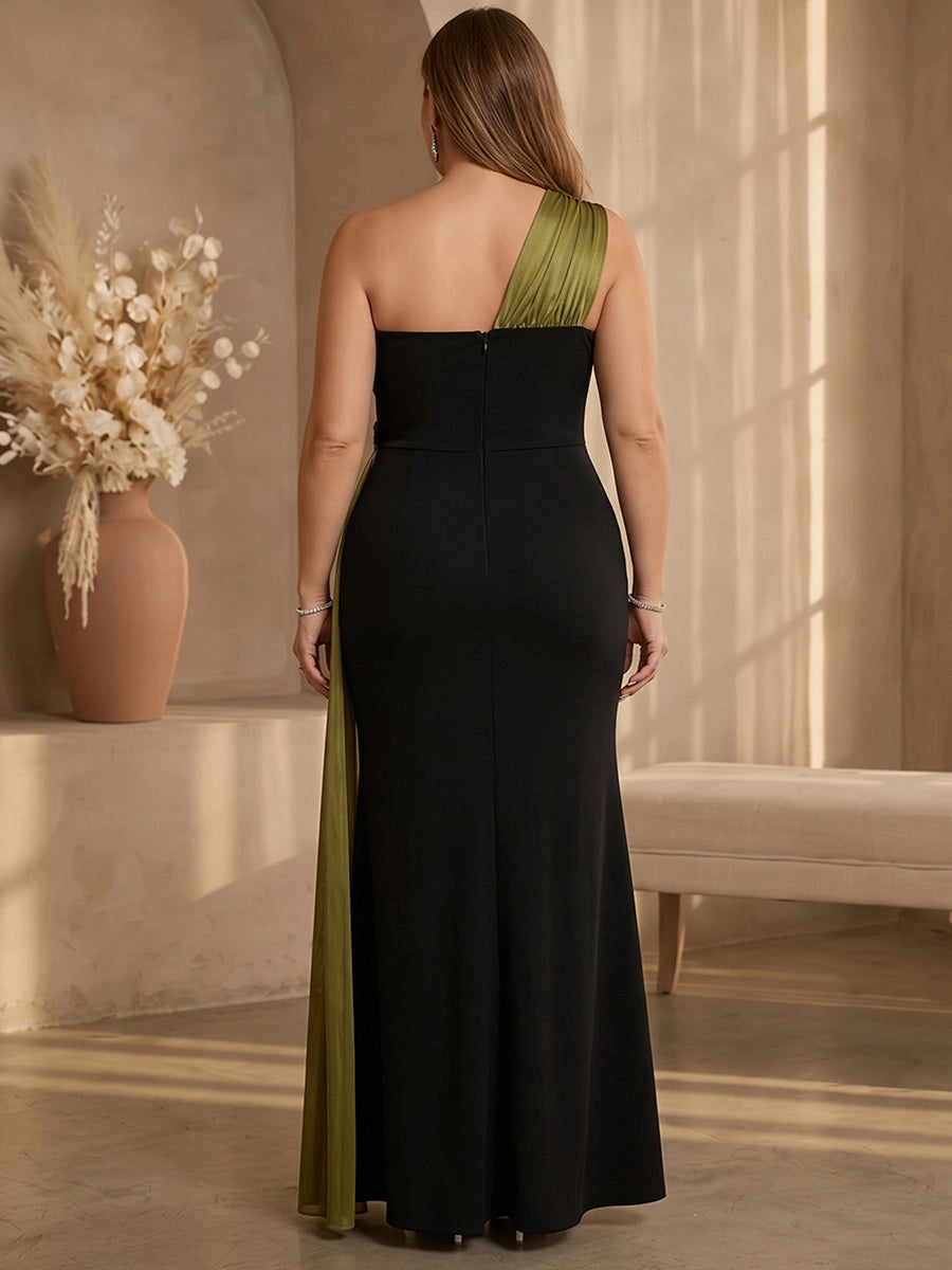 Black plus size formal dress back view, one shoulder strap, center back zipper, olive green draped sash and mermaid floor length skirt
