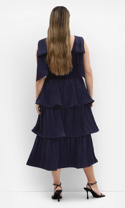 Roselle Dress plus size navy satin formal midi dress, large bow‑back tiered ruffle gown back view