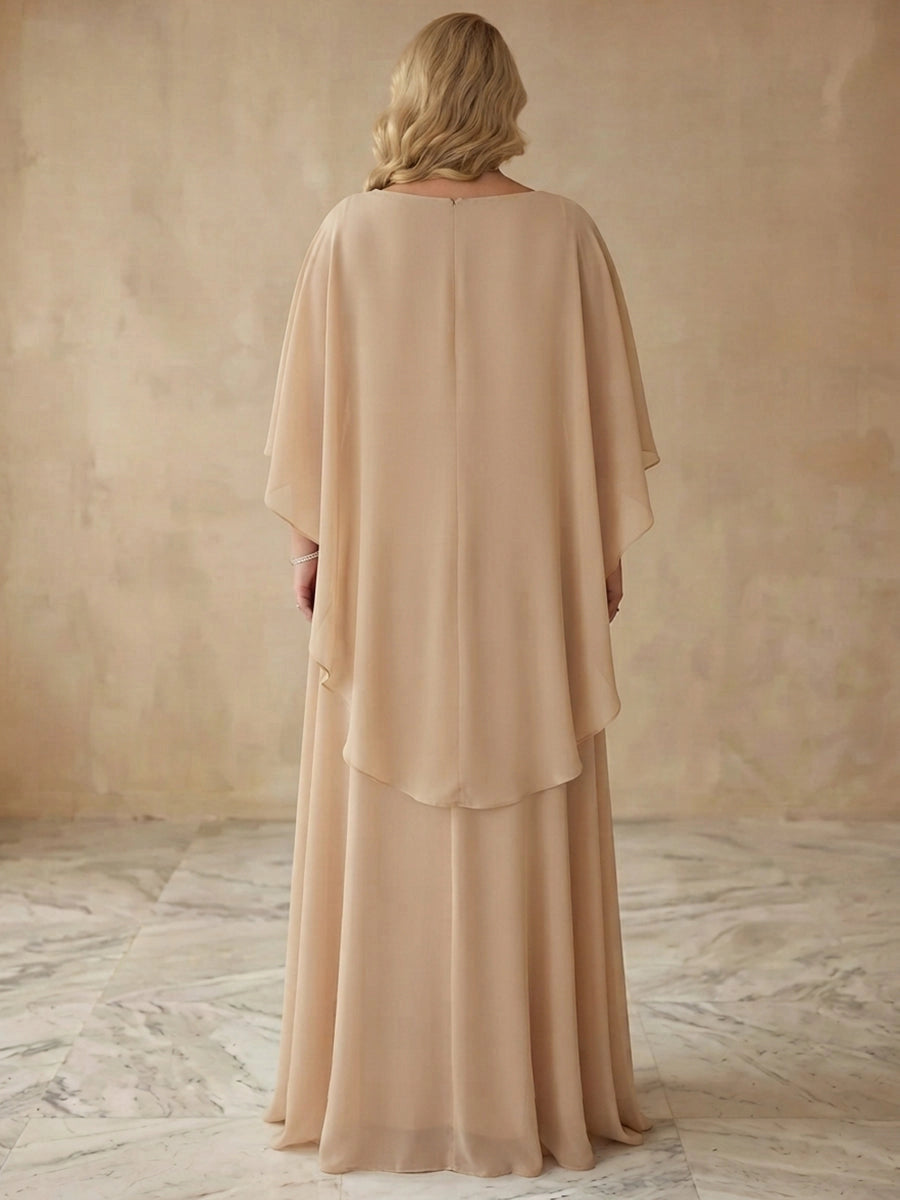 Champagne plus size formal gown back view, round neck, center back zipper, flowing capelet overlay and long chiffon skirt
