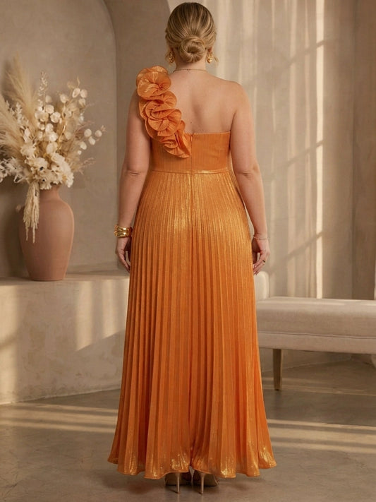 Orange plus size evening gown back view, one shoulder ruffle flower, center back zipper and metallic pleated floor length skirt
