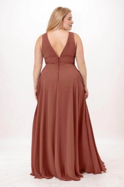 Terracotta chiffon bridesmaid dress with a deep V-back, pleated shoulder panels, ruched waistband and center-back zipper, back view.