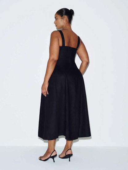 roselledress black structured plus‑size midi formal dress wide shoulder straps simple back a‑line flared skirt wedding guest dress back view