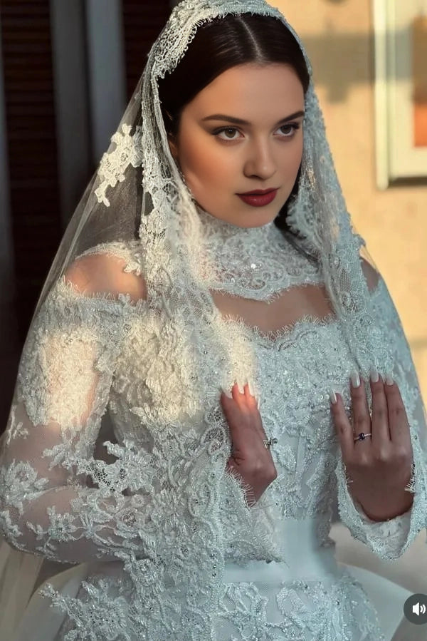 Curvy bride wearing Roselledress illusion back plus‑size beaded lace mermaid wedding dress back view