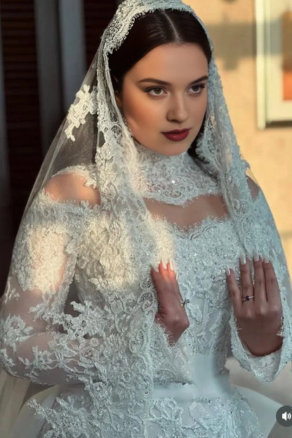 Curvy bride wearing Roselledress illusion back plus‑size beaded lace mermaid wedding dress back view