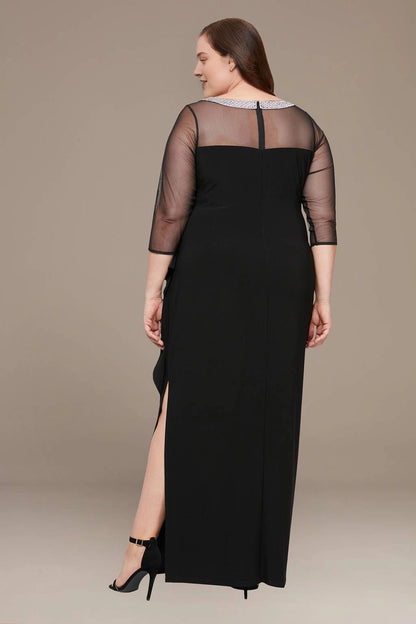Black plus size formal dress with sheer back panel, center zipper and side slit
