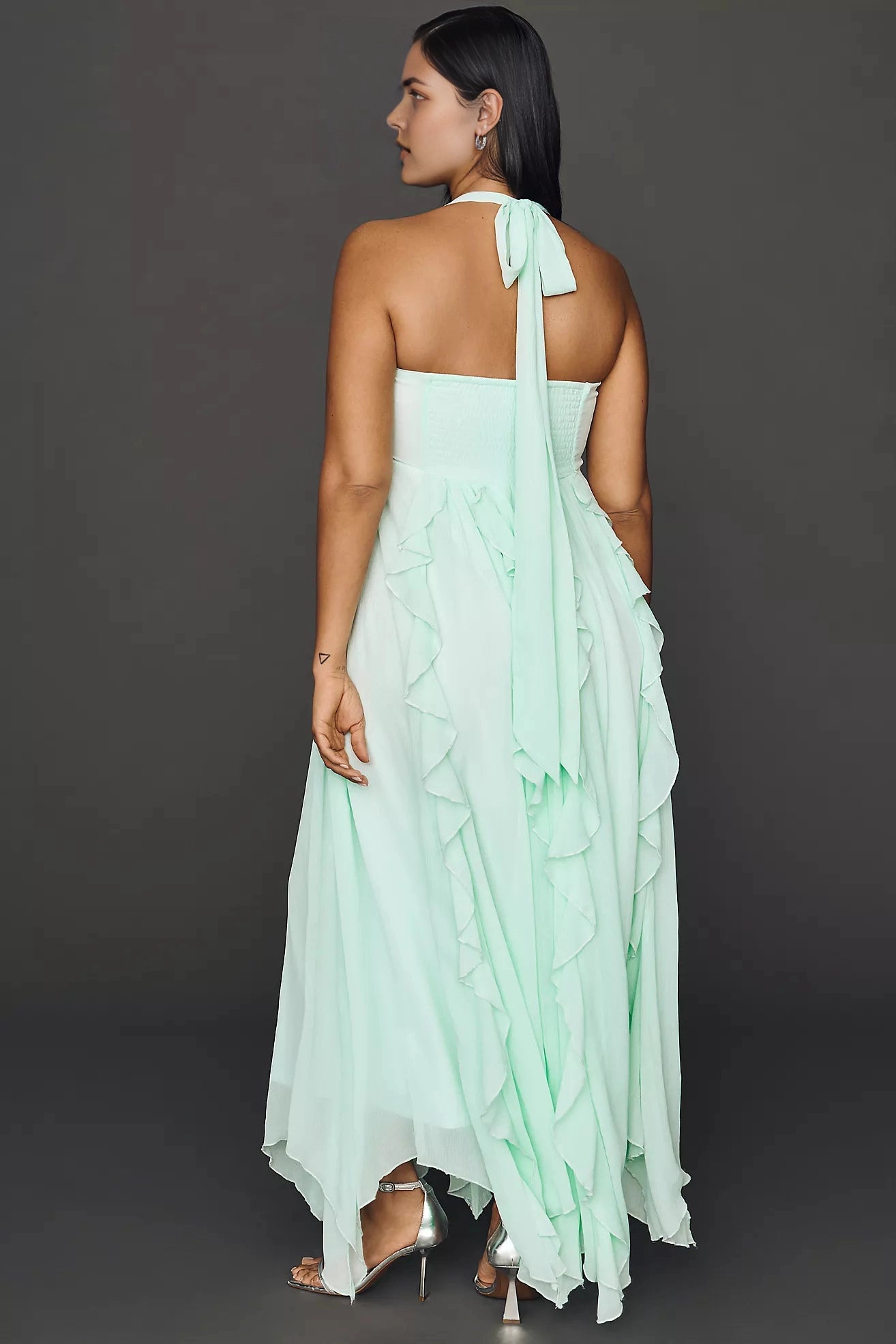 Back view of roselledress mint tie‑back smocked plus size ruffled chiffon maxi formal guest dress
