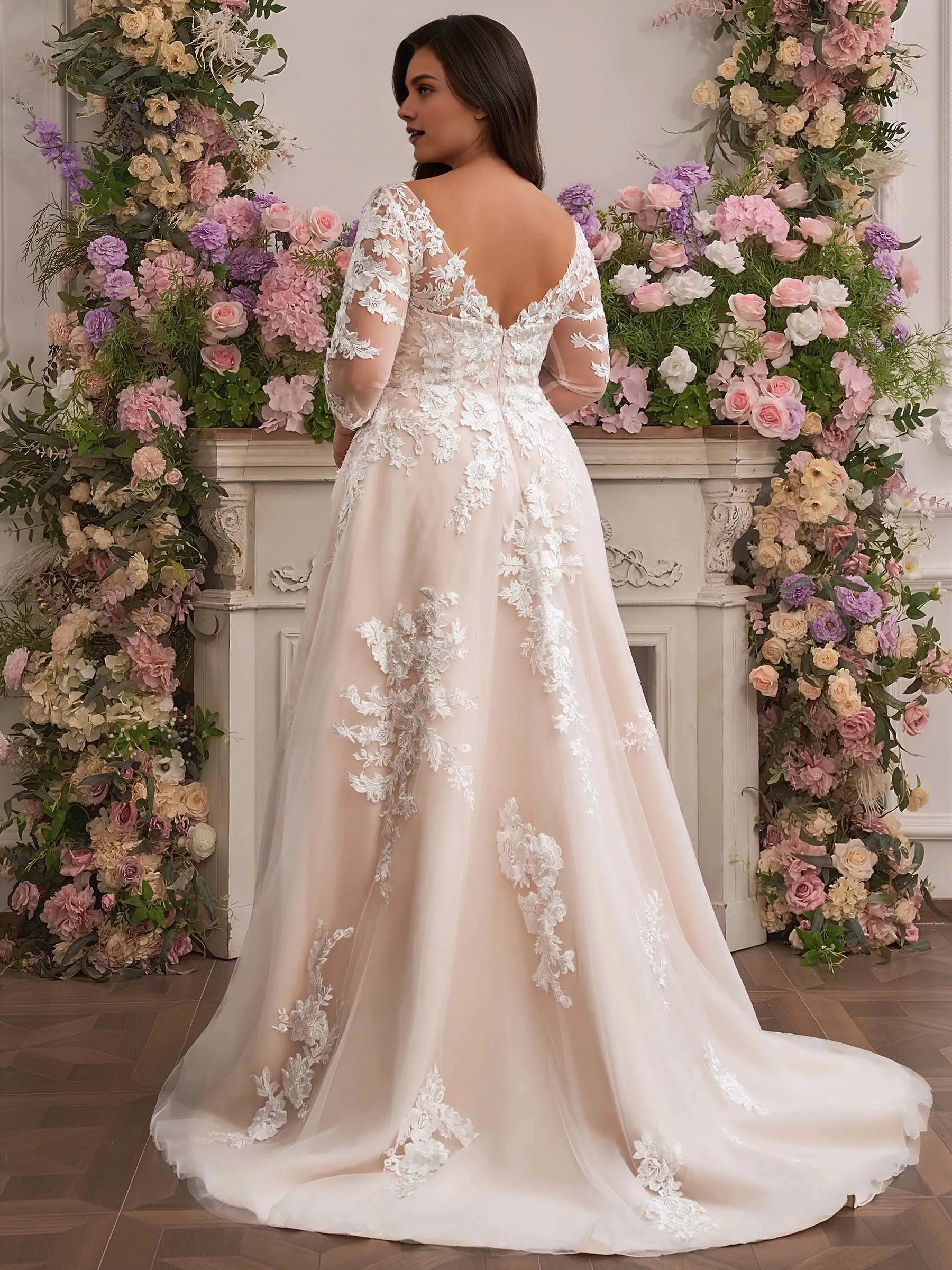 Curvy bride wearing Roselledress v zip‑back plus‑size lace wedding dress back view