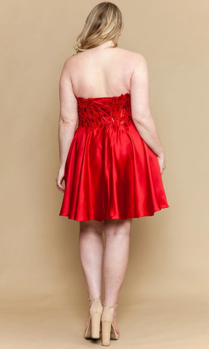 Plus size red homecoming dress featuring strapless lace-up corset back with lace applique