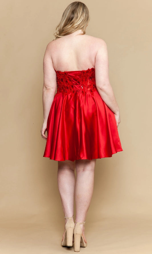 Plus size red homecoming dress featuring strapless lace-up corset back with lace applique