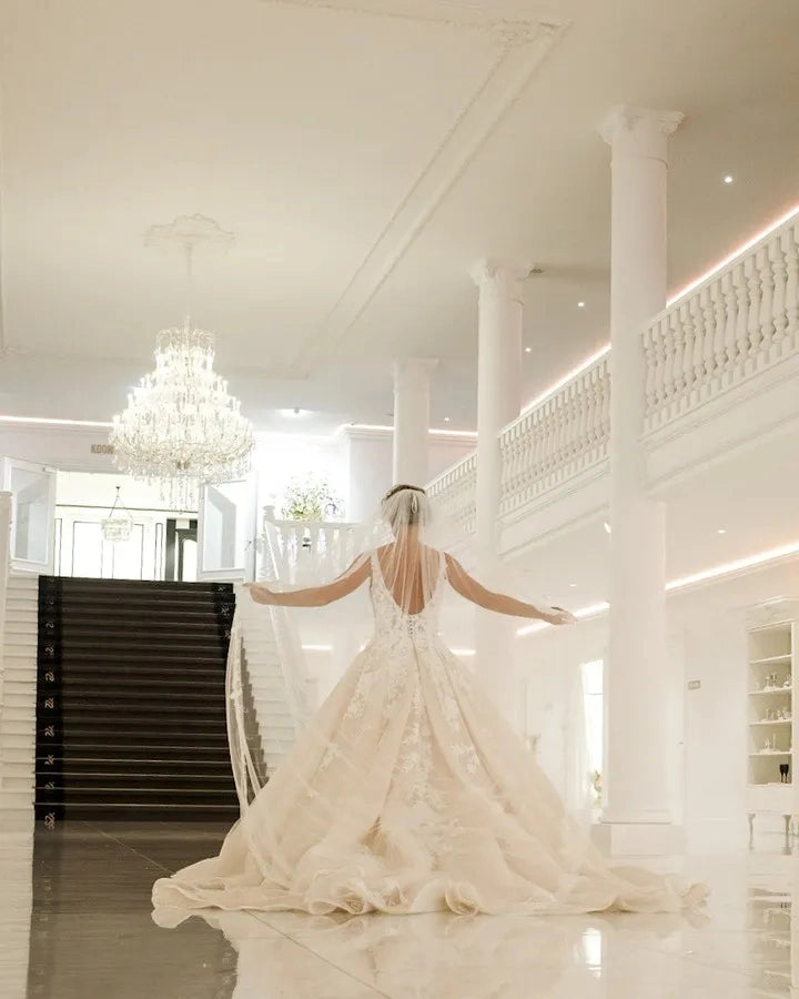 Back view Roselledress plus‑size bridal gown deep u open back lace‑up corset champagne lace train wedding dress