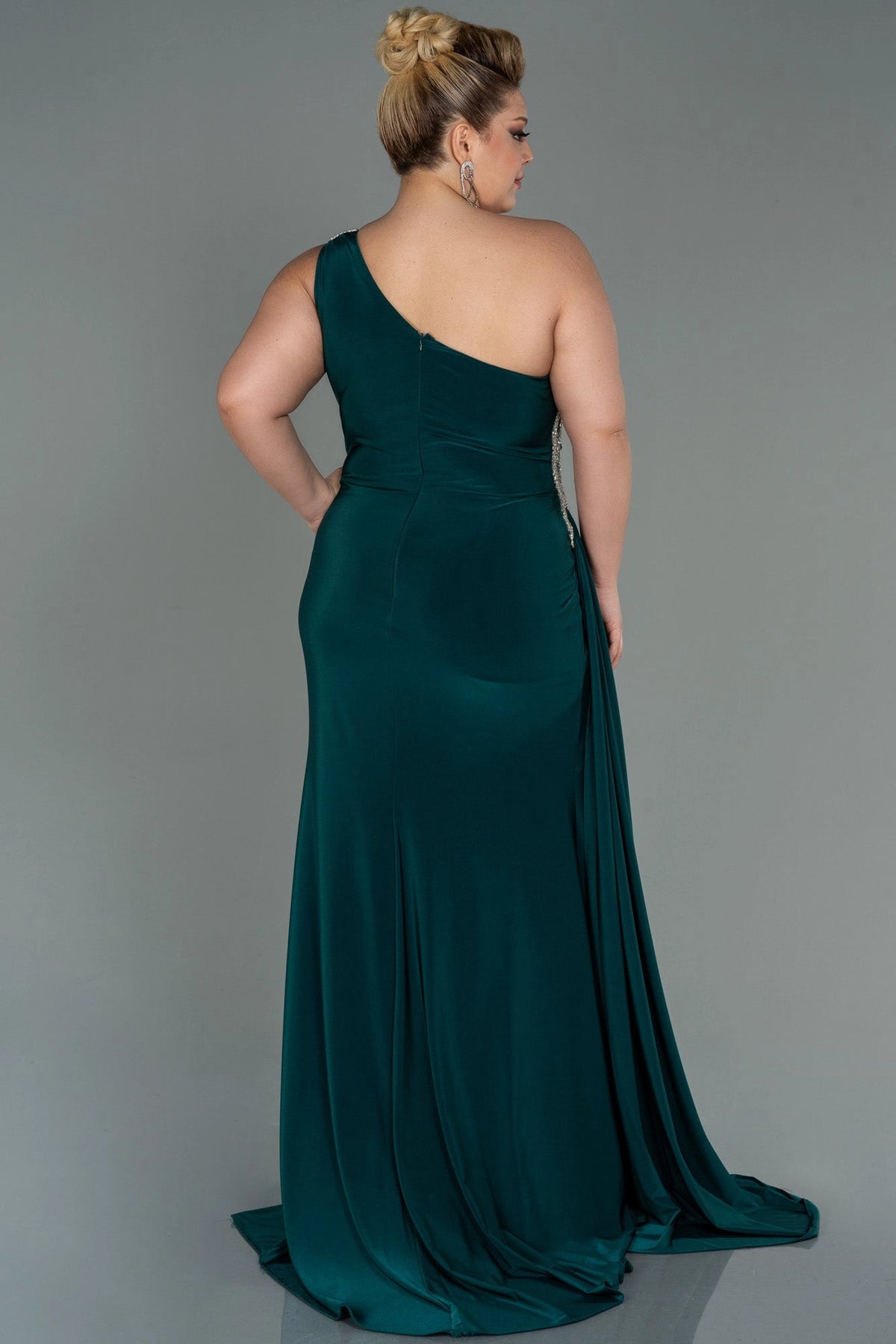 Back view of a roselledress plus size emerald one shoulder evening dress with zipper back and sweep train
