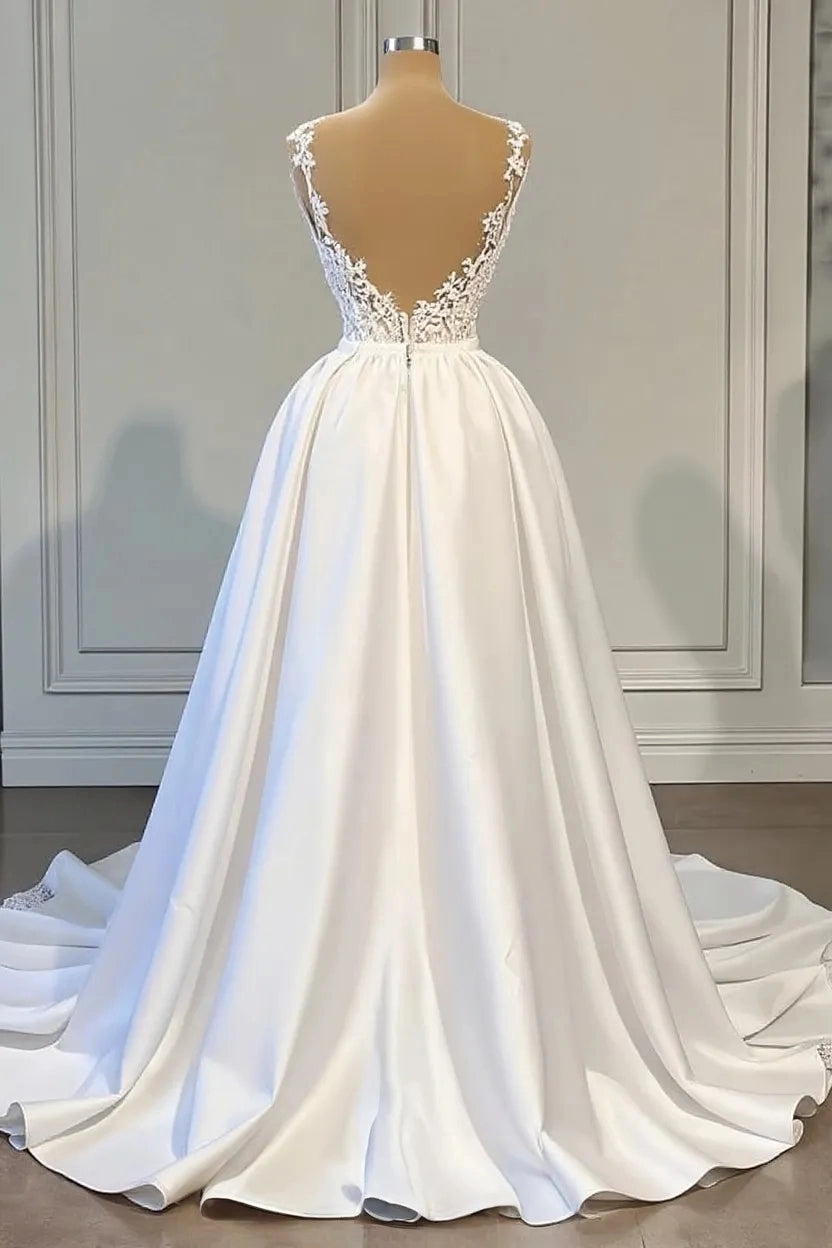 Curvy bride wearing Roselledress v‑back plus‑size convertible wedding dress satin chapel train