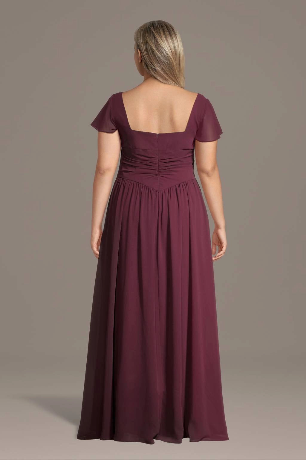 Burgundy plus size formal dress with square back, center zipper and flowing pleated skirt
