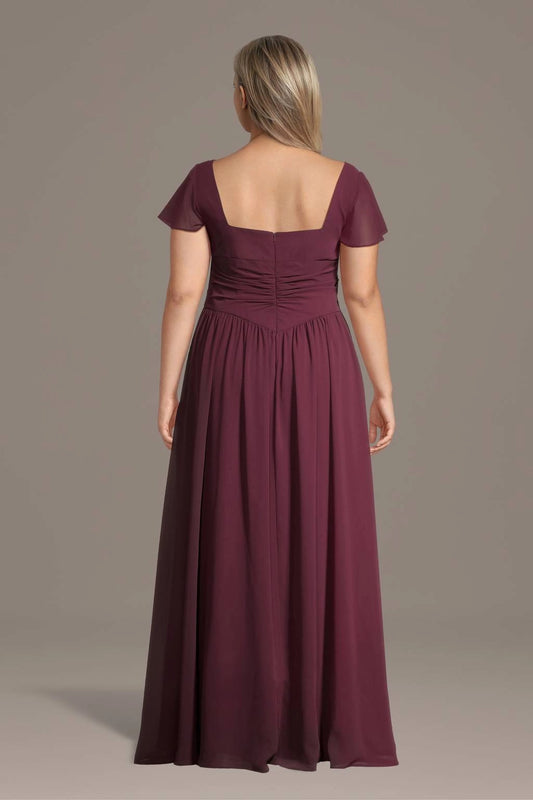 Burgundy plus size formal dress with square back, center zipper and flowing pleated skirt