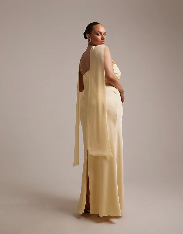 Back view of roselledress butter yellow open‑back cape detail plus size slit floor‑length formal gown