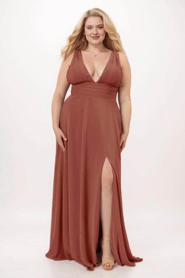 Terracotta chiffon bridesmaid dress with a plunging V-neck, ruched empire waist, wide straps and high side slit, front view.