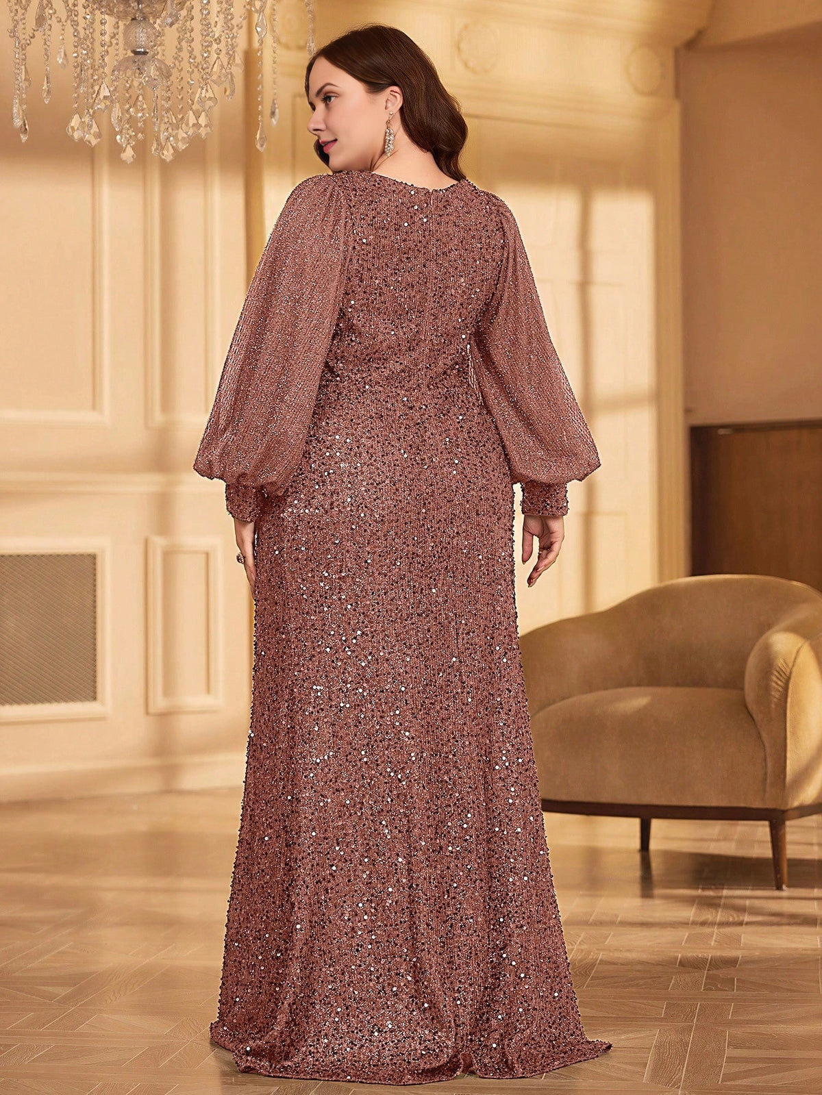 Back view of a plus size mauve sequin closed-back mermaid mother of the bride dress