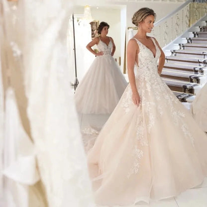 Elegant Ball‑Gown Deep‑V Sleeveless Deep‑U‑Back Train Plus Size Wedding Dress