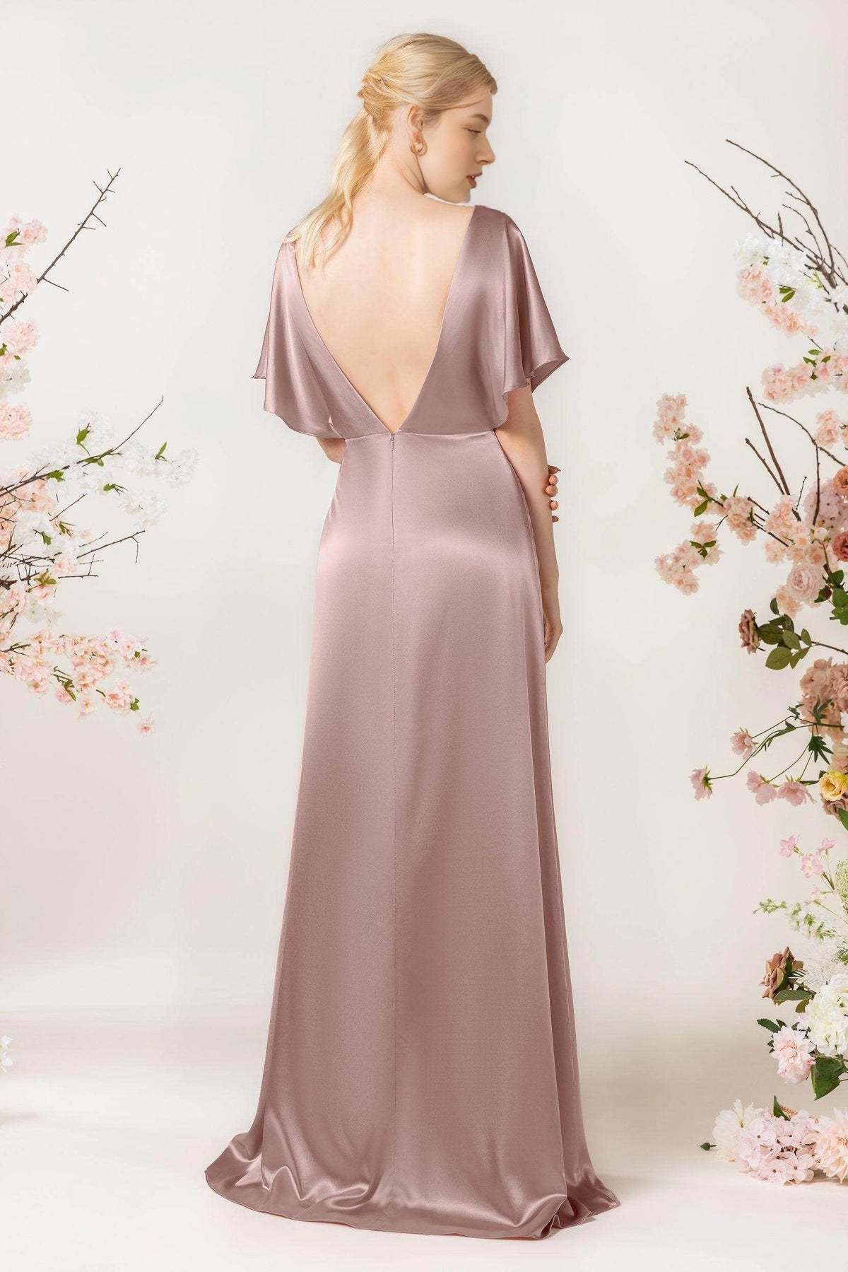 Back view of Roselledress mauve bridesmaid dress with a deep V open back, flutter sleeves and a center zipper below the waist.