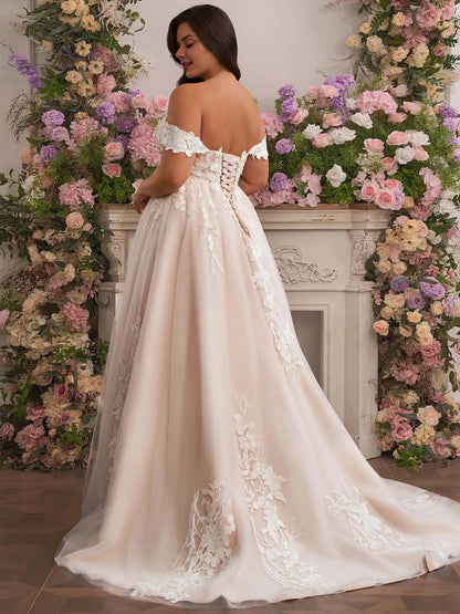 Curvy bride wearing Roselledress corset lace‑up back plus‑size lace wedding dress back view