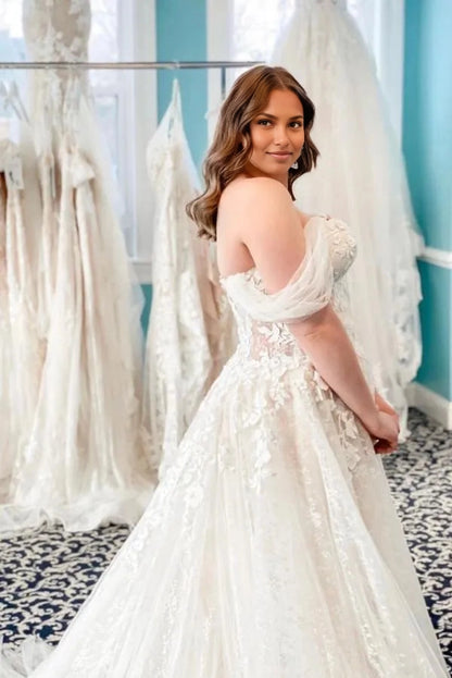 Romantic A‑Line Sweetheart Off‑Shoulder Tulle Sleeve Sheer Back Train Plus Size Wedding Dress