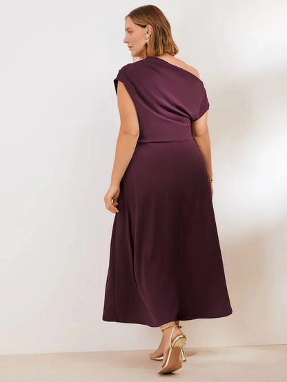 Back view of roselledress plum closed back plus size one-shoulder flowy midi formal wedding guest dress