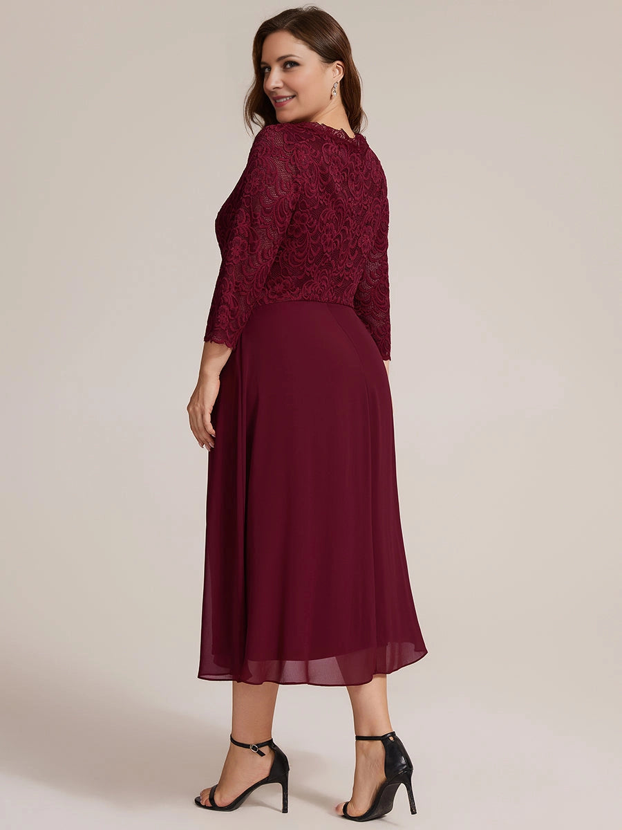 Burgundy lace mother of the bride dress with lace back and flowing midi skirt