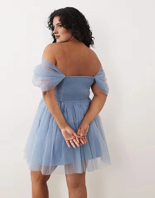 Plus size dusty blue tulle homecoming dress featuring smocked back and off-the-shoulder bands
