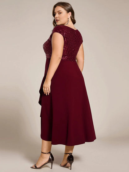 Burgundy plus size midi dress back view, V-back, sequin bodice, cap sleeves, center back zipper and asymmetrical midi skirt

