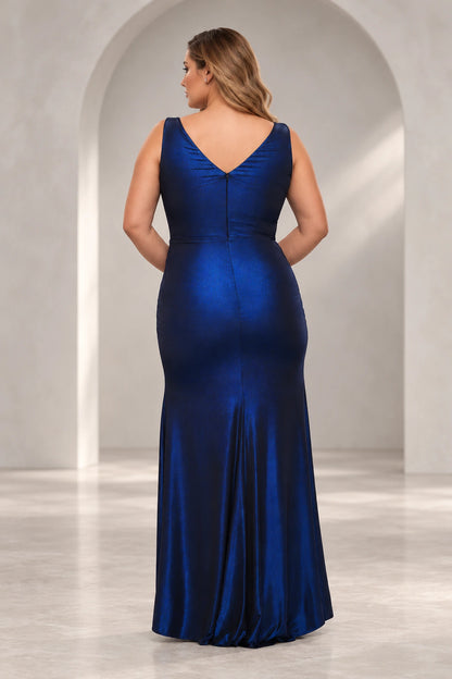 Back view of Roselledress plus size blue metallic evening dress featuring a V-back, center-back zipper and gently flared floor-length skirt.