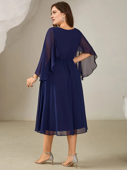 Navy blue plus size tea-length mother of the bride dress with sheer chiffon cape sleeves and modest closed back