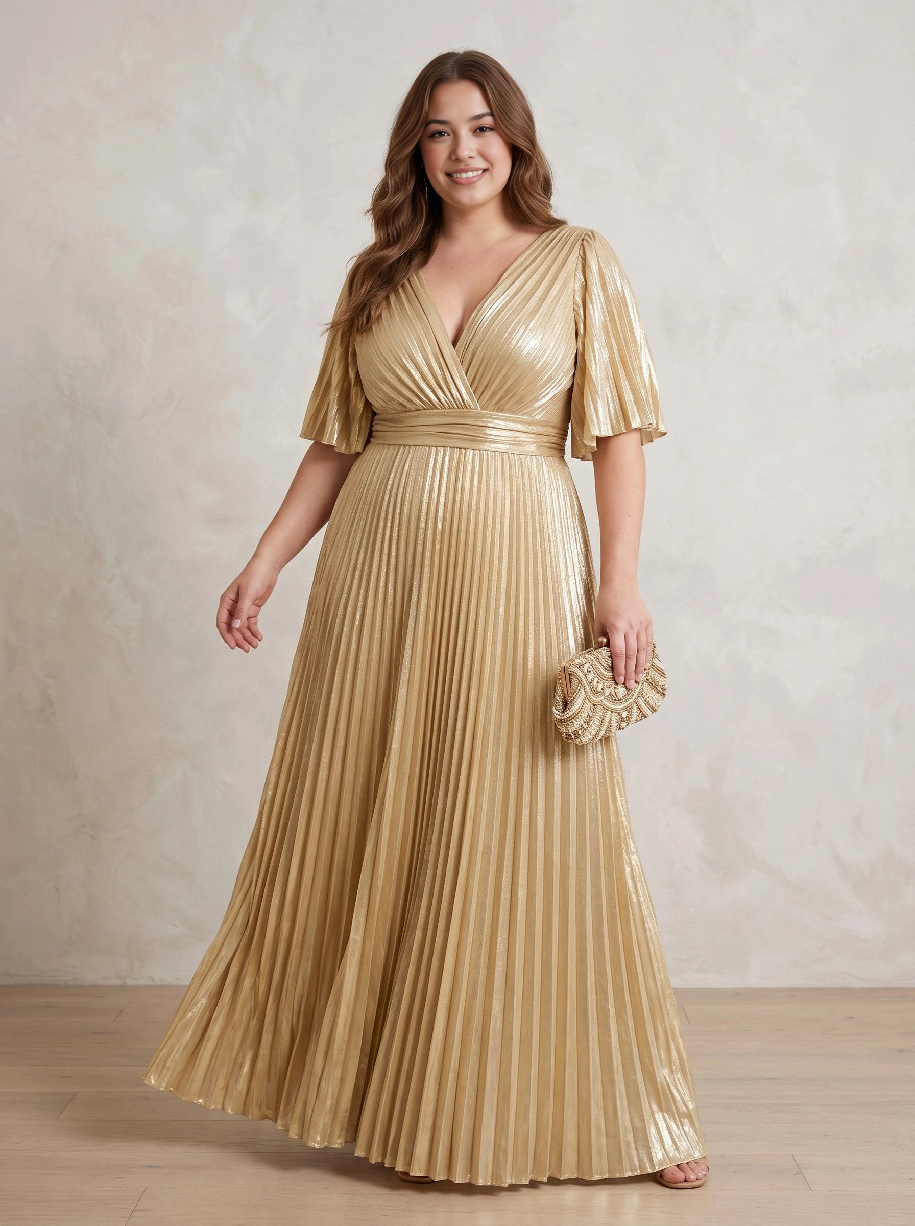 Roselledress gold metallic pleated plus size mother of the bride dress front view, wrap v neck flutter sleeve floor length formal gown