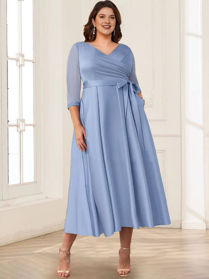 Roselledress dusty blue plus size mother of the bride dress,a‑line wrap v‑neck 3/4 lace cuff sleeve midi formal gown with pockets