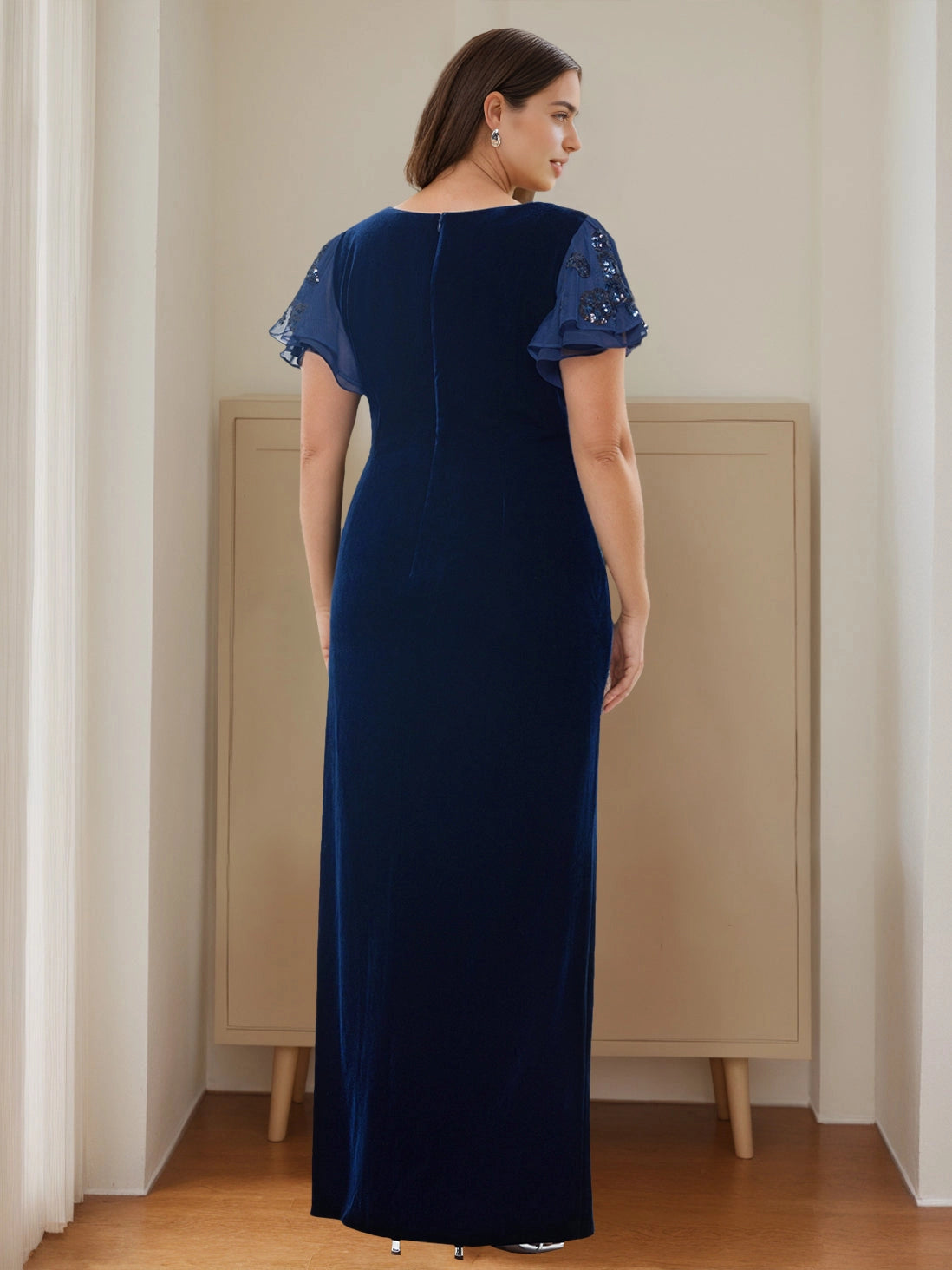 Back view RoselleDress navy velvet curvy formal dress solid closed back flutter short sleeve floor length mother gown