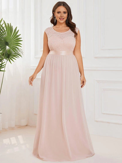 Roselledress blush plus size bridesmaid dress front view, cap sleeve lace bodice sash waist chiffon long formal gown