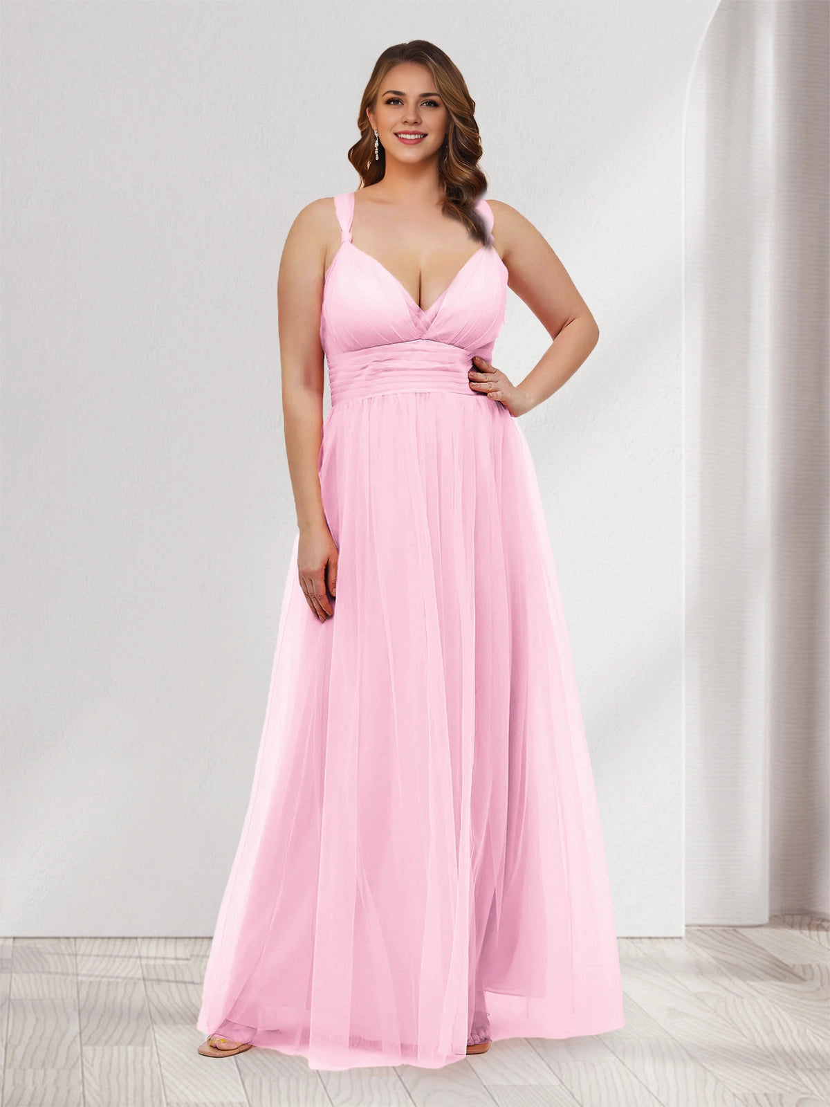 Roselledress blush tulle plus size bridesmaid dress front view, deep v-neck ruched waist spaghetti strap flowy a-line formal gown