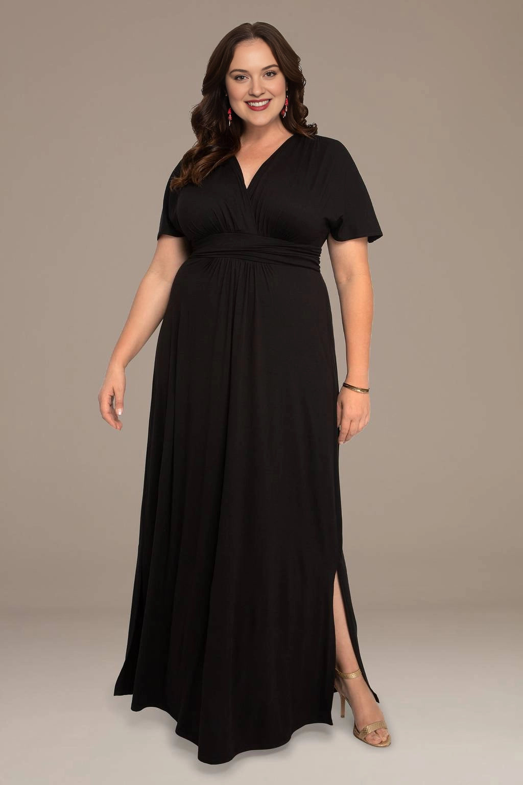 Black plus size mother of the bride dress with V-neck flutter sleeves and ruched waist